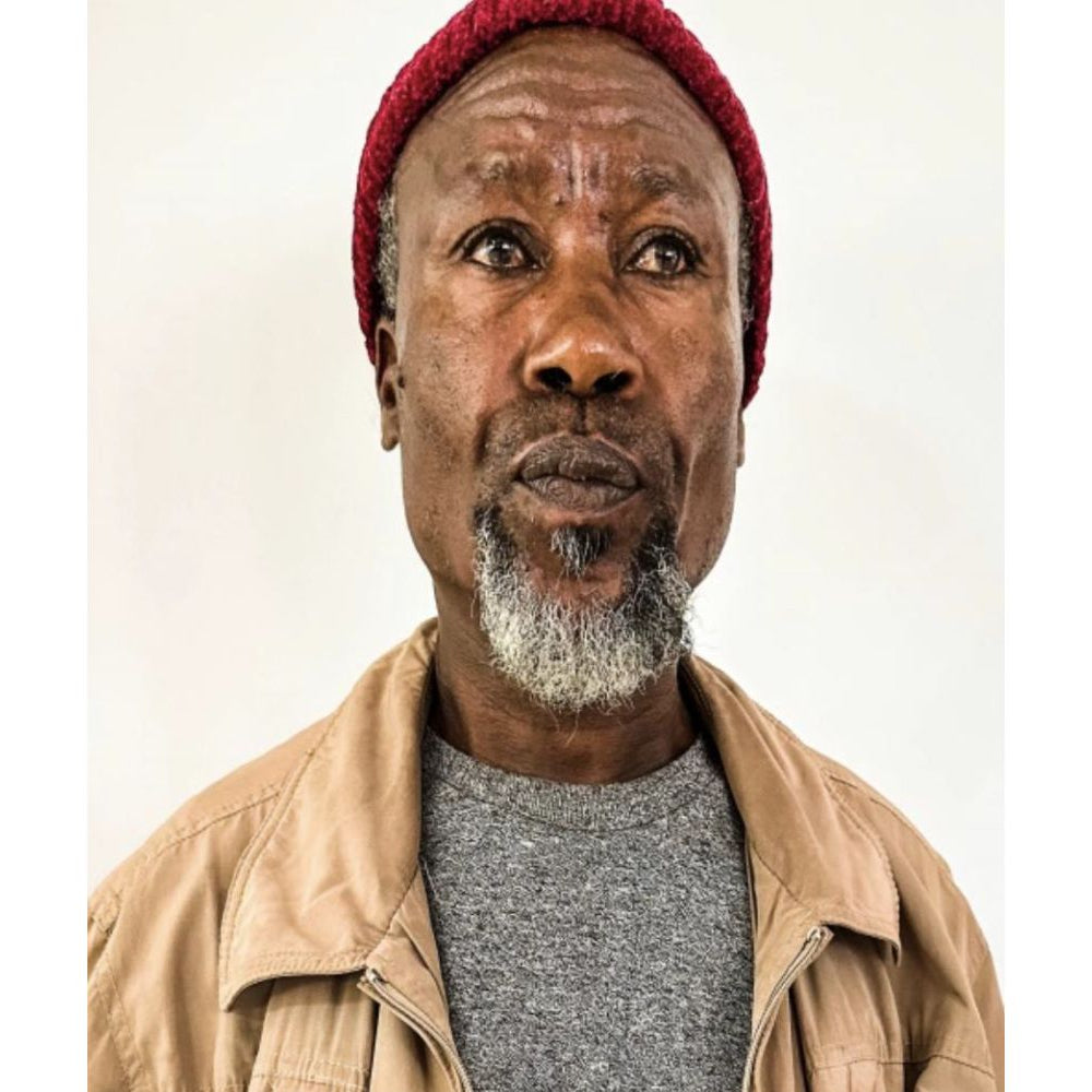 Portrait of Kefyalew Obese, fourth-generation Ethiopian coffee farmer from Yirgacheffe who produces natural anaerobic coffees with vibrant fruit flavors.